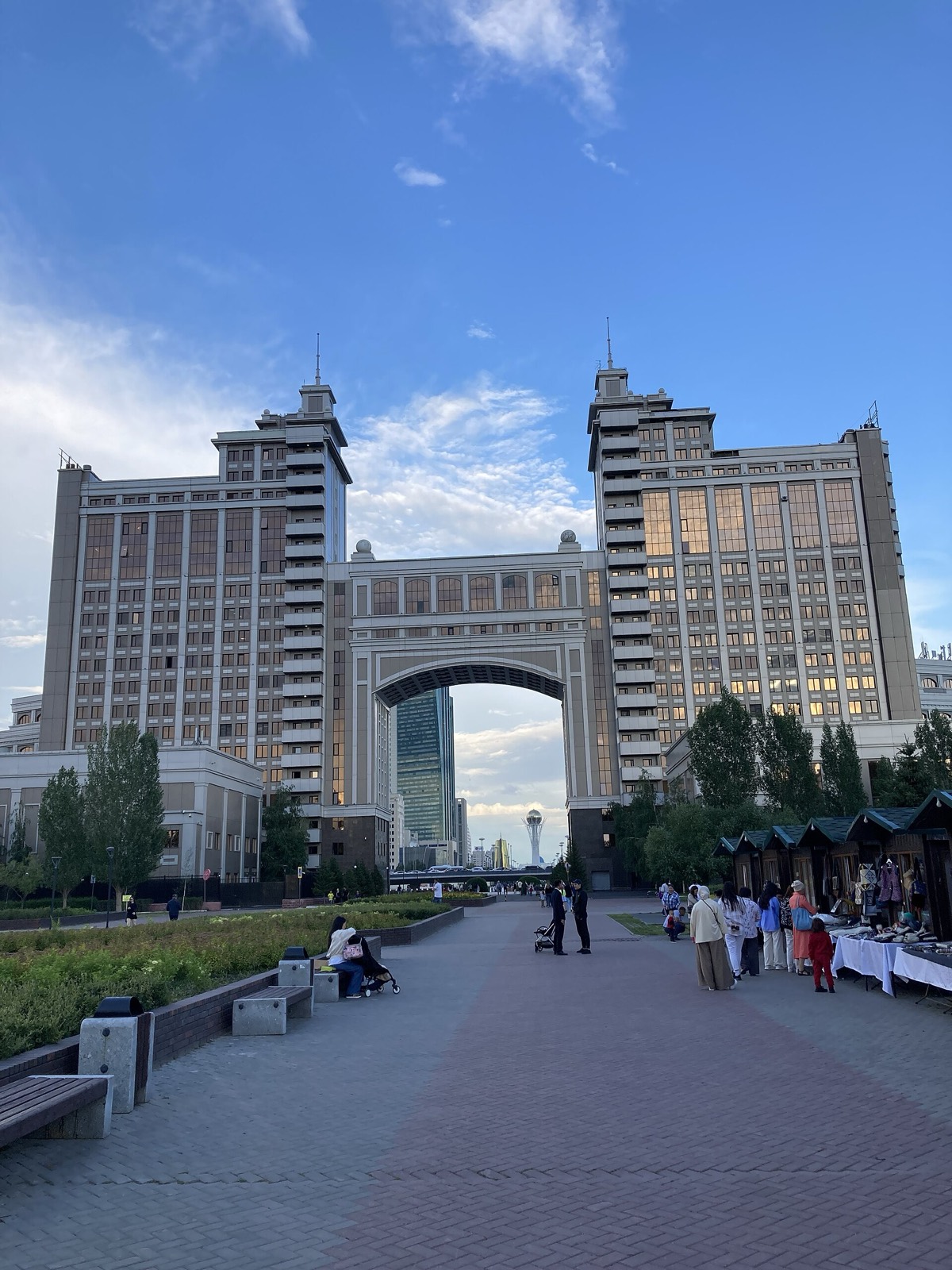 The City Gate in central Astana on a summer evening, with the Baiterek tower in the distance